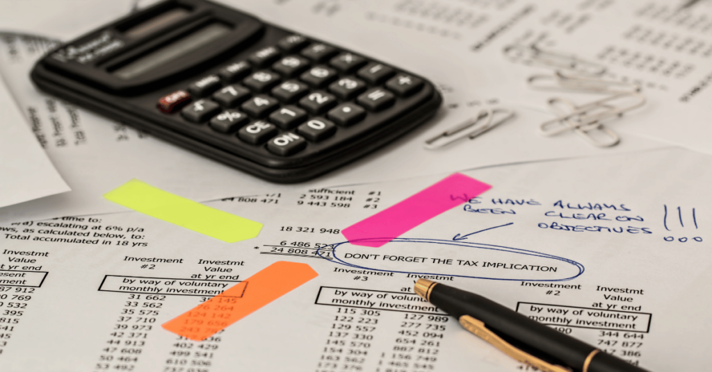 Calculator being used to calculate interest rates on loan